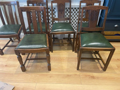 oak dinning room chairs with green leather base