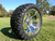 Radial 23x10.5R15 Innova Edge lifted golf car tire mounted on AR688 chrome wheel. 