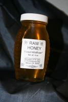 An 8 ounce jar of Monastery Honey 