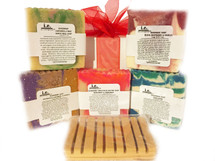 HANDMADE SOAPS: Our all natural soap is made with love.  We chose organic ingredients that are balanced for their cleansing and moisturizing properties.  The soap features a unique block design of hot processed and cold processed soap; each bar has a slightly different design.  Choose the fragrant that best suits your taste.  Directions:  Wet a wash cloth and rub soap together until it lathers, then apply to your body for a clean, moisturizing, and refreshing aroma.  FOR EXTERNAL USE ONLY.  Ingredients: organic unrefined coconut oil, pure olive oil, organic palm oil, pure castor oil, organic cocoa butter, distilled water, sodium hydroxide (lye), fragrance oils, essential oils, and color micas. Some soaps also include shea butter, apricot kernel oil, palm oil, avocado oil, neem seed oil, goats milk, butter milk, beer, pure cacao, oatmeal, lavender petals, chamomile flakes, crushed almonds, green tea powder, green tea leaves, and seaweed powder  SELECT THE SCENT TO SEE ANY ADDITIONAL  INGREDIENTS OR ADDITIVES USED FOR OUR HANDMADE SOAPS.  Size:  Approximately 7 oz depending upon the cut of the soap.  Customers:  Pregnant women should consult their physician before using any products containing certain essential oils. These are natural soaps, which are cured a minimum of six weeks before they are sold. Designs vary by bar. Additional soaps scents become available every two months.  Also see our novelty bars; 5-7 oz.  Soap dish (not pictured); or our Cleansing Soaps.  Soap dish may be purchased separately in Accessories.  Each soap is beautifully packaged. For a lasting bar, keep in a dry cool place.  Do not leave sitting in water.  MADE IN YONKERS, NY