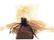 BATH ACCESSORIES SET:  This set is the perfect complement to your bathing enjoyment or to add to any gift.  The set includes:  one wooden soap dish with grooves; one small wooden scoop; one natural pumice brush; and one scented sachet in an organza bag.