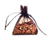 SCENTED SACHET:  This Scented Sachet is mixed with a delightful fragrance combination.  It can be put in an "intimates" drawer to provide a nice aroma to your special garments or it can be put in your car to provide a nice scent.  Size:  3 x 4.  Packaged:  The scented beads come packaged in an organza bag or a cloth bag.  Both pictured.  FOR EXTERNAL HOME OR CAR USE ONLY.  KEEP OUT OF REACH OF SMALL CHILDREN.  DO NOT CONSUME THE SCENTED BEADS.