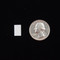 One 5/16" x 1/2" Small Rectangular Self Adhesive Plain Label next to a U.S. Quarter.
