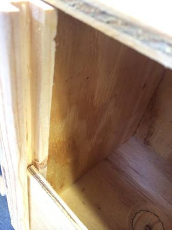 Inside of small breeding boxes. Comes with small perch and removable wood plank 