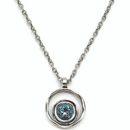 The Serenity necklace in Aquamarine by Patricia Locke Jewelry has a Sterling silver chain with an Austrian crystal setting.