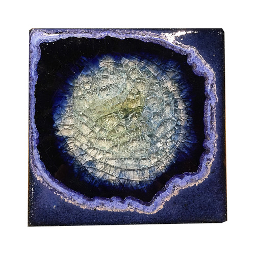 Coaster in Blue by Kerry Brooks Pottery.  Ceramic Coaster with Geode Style Fused Glass in Blue. These awesome glass tiles are decorative and functional, with little felt feet to protect your table tops. The perfect holiday, wedding, graduation, or hostess gift!
Can also be used as tiles (just remove the felt sticker feet) Each coaster tile is 4"x4". Some variation in color is due to the handmade nature of these items.
(Does not contain actual geodes.) 
