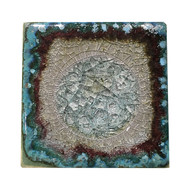 Coaster in Green by Kerry Brooks Pottery.  Ceramic Coaster with Geode Style Fused Glass in Green. These awesome glass tiles are decorative and functional, with little felt feet to protect your table tops. The perfect holiday, wedding, graduation, or hostess gift!

Can also be used as tiles (just remove the felt sticker feet) Each coaster tile is 4"x4". Some variation in color is due to the handmade nature of these items.
(Does not contain actual geodes.) 
