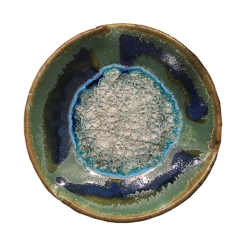 Small Pinch Plate in Green by Kerry Brooks Pottery.  Small Pinch Plate with Geode Style Fused Glass in Green. These awesome glass plates are decorative and functional. The perfect holiday, wedding, graduation, or hostess gift!

 Each small plate is 7.5" in diameter and 1.5" deep. Some variation in color is due to the handmade nature of these items.
(Does not contain actual geodes.) 
