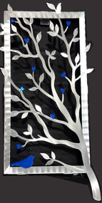 Window View - Blue, 15"x30" by Sondra Gerber.
Hand brush aluminum wall Sculpture with glass inclusions.  The use of positive and negative shapes within the intricate cut of the designs cast alluring shadows that interact with the piece itself.