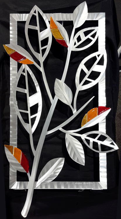 Striped Leaves - Fall
Hand brush aluminum wall Sculpture with glass inclusions by Sondra Gerber. 16"x29"