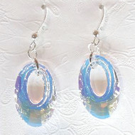 These Helios earrings in AB CRYSTAL from Snooty Jewelry are a delight to wear. Wonderful sparkle shines from these 20 mm Swarovski Elements Crystals with sterling silver ear wires.
This is a clear crystal which filters different colors depending on what colors are behind and around it.
Not all colors may be in stock at all times and some colors may only be available for purchase through the gallery. Please call for availability.