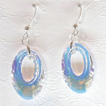 These Helios earrings in AB CRYSTAL from Snooty Jewelry are a delight to wear.  Wonderful sparkle shines from these 20 mm Swarovski Elements Crystals with sterling silver ear wires.
This is a clear crystal which filters different colors depending on what colors are behind and around it.

Not all colors may be in stock at all times and some colors may only be available for purchase through the gallery. Please call for availability.