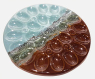 This Deviled Egg Tray in OCEAN TIDE glaze from Clay in Motion holds the whole dozen. Unfortunate for the pre party snackers but a great way to display your perfect egg masterpiece. 
Each porcelain form is hand glazed, so colors and patterns may vary slightly from photos shown. 