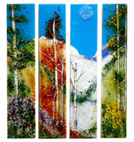 Four Seasons - 4 piece set by Kathi D Dougherty portrays all the seasons in individual panels to create a dramatic scene in fused glass. Each panel measures 6" x 30". These are one-of-a-kind pieces. CALL the gallery to get pictures and determine what is actually available for purchase.
970-577-8100