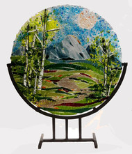 The 'Spring Ribbons' in a steel stand by Kathi Dougherty captures the spring colors of a lovely mountain day. This 16" fused glass round rests in a black coated steel stand for displaying.
Shop now or call to speak with a sales associate for additional assistance.
Earthwood Collections, 970-577-8100