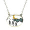 An 18mm x 20mm oval by Athena Designs displays a charming Mountain scene. 