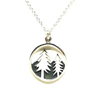 This 15mm circle pendant by Athena Designs is a wonderful piece for any tree lover. Two tall pine trees adorn an oxidized mountain background. The sterling silver chain as a finished length of 17" with a 1" extender.