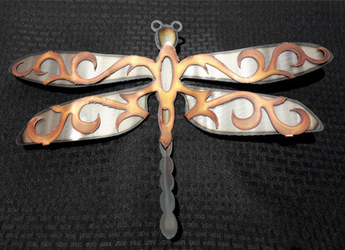 This large scrolled dragonfly wall piece by Greg Gowan is made from torch cut copper and steel. Dimensions: 18" x 13". 