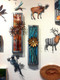Crazy Dazy wall flower art by Greg Gowan makes a fun and cheerful display.