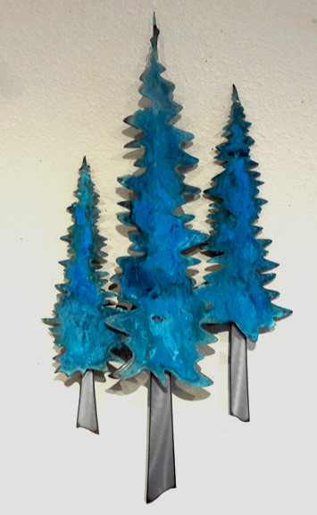 This Pine tree trio wall art by Greg Gowan is made from torch cut copper and steel. Dimensions: 14" x 27" x 2".  Three Patina trees.