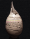 This medium Kiva in Desert Sand glaze is approximately 22" H X 10.5" W. 

