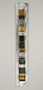 Wall Totem in Earth by Hands On Art Glass. 2"x24", fused glass on aluminum. Please call our galleries to see which pieces are currently on hand. 