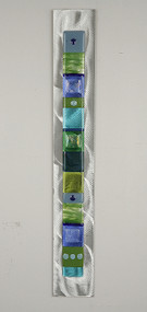 Wall Totem in Water by Hands On Art Glass. 2"x24", fused glass on aluminum. Please call our galleries to see which pieces are currently on hand. 