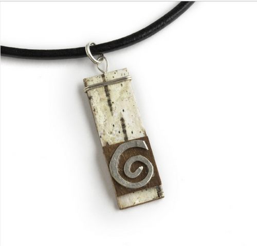 NON2 Nordic Swirl Necklace by Tessoro Jewelry, natural birchbark, hand hammered sterling silver, black leather cord 17", pendant 1 1/2" x 3/8". 