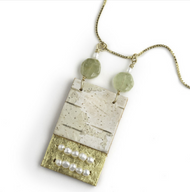 EN2 Etruscan Gold Leaf, Garnet, and Pearl Necklace by Tessoro Jewelry, 23k gold leaf on natural birchbark, grossular garnet and freshwater pearl, vermeil box chain 18", pendant is 1 1/2" x 3/4"."