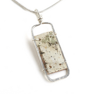 CAN9 Calder Sterling Necklace by Tessoro Jewelry, natural birchbark, hand hammered sterling silver, sterling silver snake chain 18", pendant 1 3/4" x 1/2". 