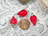 Resin charms  measuring 12x20mm with 2mm silver iron charm loop
