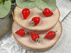 Resin charms  measuring 12x20mm with 2mm silver iron charm loop