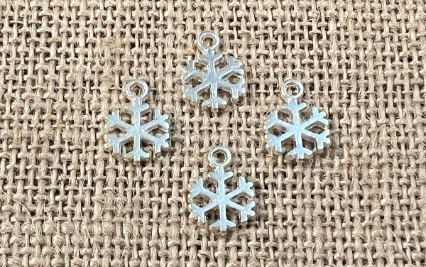 1  Bright Silver Snowflake Charms - Aunt Jenny's Beads