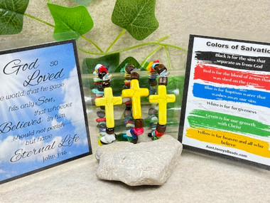 Gemstone Chip beads in the colors of salvation, a Howlite cross, natural wood beads all on a quality stretchy cord with a laminated card