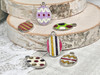 Glittery Enamel Easter egg charms that measure 11x15x1 with 2mm loop holes