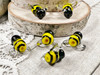 Yellow & black with clear glass wings, 15x16x11mm with 1mm beading holes