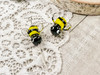 Yellow & black with clear glass wings, 15x16x11mm with 1mm beading holes