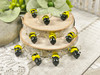 Yellow & black with clear glass wings, 15x16x11mm with 1mm beading holes