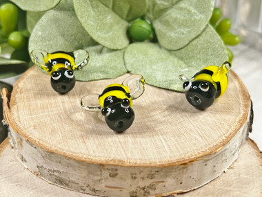 Yellow & black with clear glass wings, 15x16x11mm with 1mm beading holes