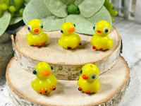 These quackers measure 14x20x12mm and have 2mm beading holes