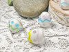 White eggs with pink, blue, yellow & green designs - 14x15mm - 1mm Hole 