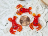These little red lobsters measure about 20x35x8mm with 1mm vertical beading holes (head to the tail)