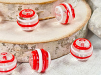 Thin Red & White strips of glass embellish these clear round lampwork beads