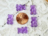 These dandy candy bear beads measure 10x15x7mm with 1mm vertical beading holes
