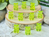 Add an lime green gummy bear to a Grinchy Christmas beaded bracelet