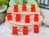 Add a red gummy bear to a Christmas Candy beaded bracelet