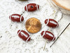 These acrylic beads measure 18x10mm with 2mm beading holes