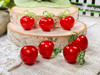 Make your favorite teacher a beaded charm bracelet with a red apple