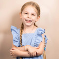 Girls diamond bow and pearl necklace