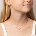 Girl wearing D for Diamond white enamel flower necklace P5367W